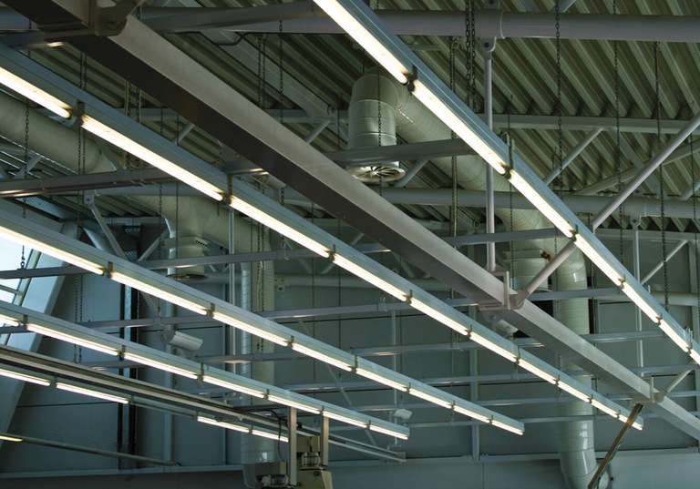 Harnessing the hum of fluorescent lights for more efficient computing